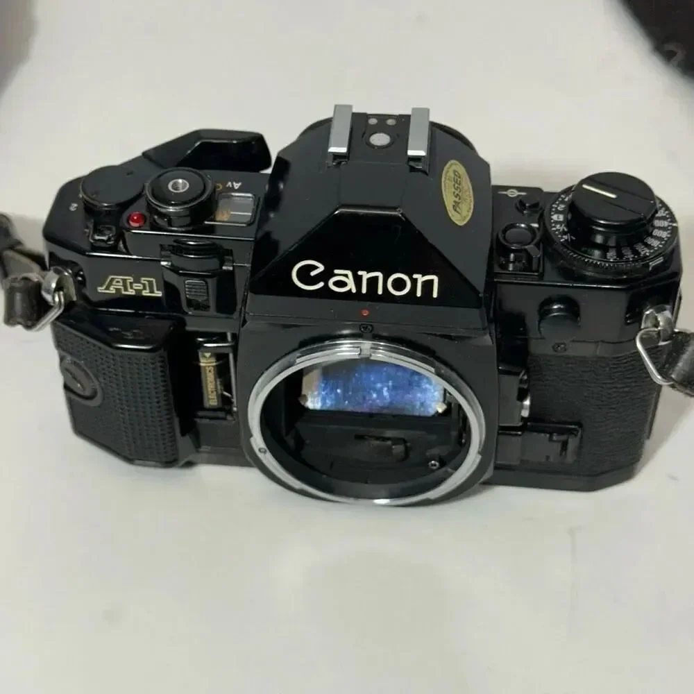Vintage Canon A-1 Black 35 mm SLR with Strap/ Body Only